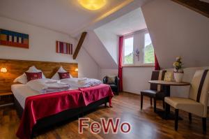 Postel nebo postele na pokoji v ubytování MoselUnion - Aparthotel Landsknecht