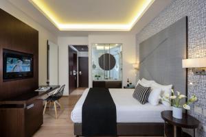 Letto o letti in una camera di Hotel Yehuda