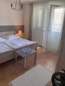 Кровать или кровати в номере Casa Fumica Apartment