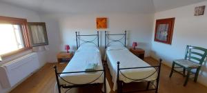 A bed or beds in a room at Casa Sant'Anna