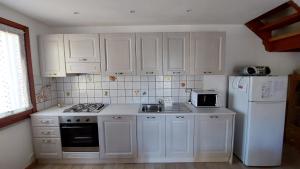 A kitchen or kitchenette at Casa Sant'Anna
