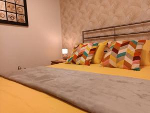 Posteľ alebo postele v izbe v ubytovaní Apartamento El Dorado cerca del mar