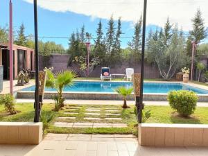 Piscina de la sau aproape de villa Marrakech piscine privée