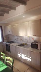 A kitchen or kitchenette at Casa Sant'Anna