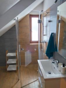 Łazienka w obiekcie Dębowy Apartamenty/Pokoje