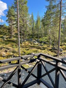 a view from the deck of the woods at Stuga i Vemdalen in Vemdalen