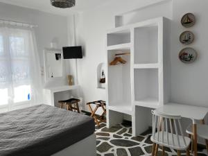Posteľ alebo postele v izbe v ubytovaní Angie's Studios