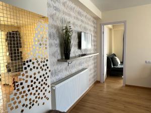 Μια τηλεόραση ή/και κέντρο ψυχαγωγίας στο Delux apartment for 6 guest, new gudauri