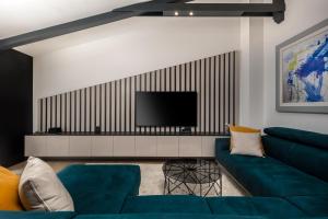 TV a/nebo společenská místnost v ubytování Apartment Forever