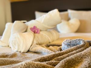 Letto o letti in una camera di Swiss Alps View Apartment - contactless self check-in