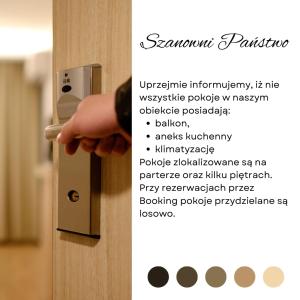 a person unlocking a door with their hand at ROYAL VILLA - Adults Only - Pokoje z widokiem na Zalew Wiślany-Grupa PlażoweLove in Krynica Morska