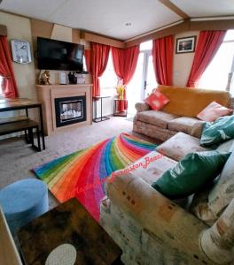 TV a/nebo společenská místnost v ubytování Barmston Beach Maple Rise 69