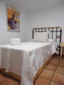 Posteľ alebo postele v izbe v ubytovaní Alojamiento Encarnación