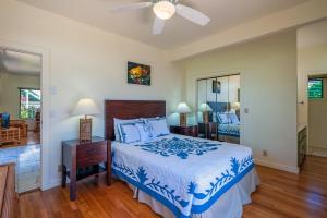 Posteľ alebo postele v izbe v ubytovaní Poipu Plantation Vacation Rentals