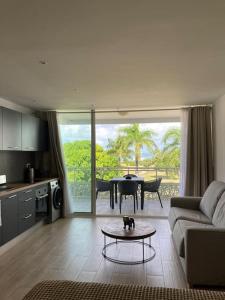 Зона вітальні в Beau studio vue mer Anse Marcel