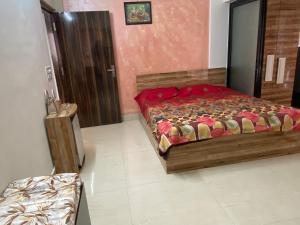 Un ou plusieurs lits dans un hébergement de l'établissement A lovely condo in New Alipore