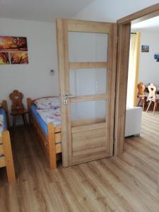 Posteľ alebo postele v izbe v ubytovaní Apartmány Horní Bečva