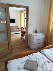 Posteľ alebo postele v izbe v ubytovaní Apartmány Horní Bečva