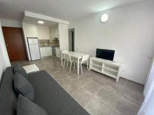 Kuchyň nebo kuchyňský kout v ubytování Apartamentos CH 2