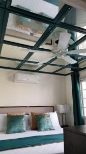 Letto o letti in una camera di Ridgeview suite 4