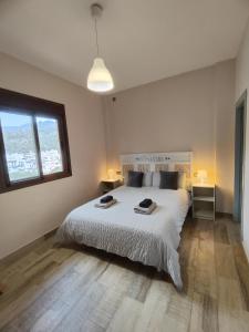Posteľ alebo postele v izbe v ubytovaní Casa Rural Sierra De Las Nieves