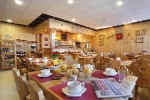 Reštaurácia alebo iné gastronomické zariadenie v ubytovaní La Pradella Bolquere T3 PYRENEES 2000