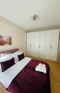 Postelja oz. postelje v sobi nastanitve New Apartment in Center of Tirana