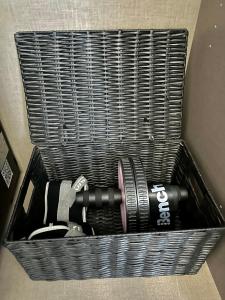 a black basket with a camera in it at Bed & Breakfast Donji Grad in Zagreb