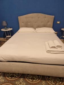 Postel nebo postele na pokoji v ubytování B&B Porto Trani