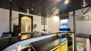 a kitchen with a sink and a counter top at Haus Luise in Delmenhorst