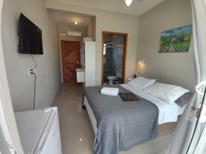 Postel nebo postele na pokoji v ubytování Pousada Solari