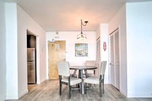 a dining room with a table and chairs at Luxe Waterfront Ft Lauderdale Condo with Beach, Pool apts in Fort Lauderdale