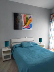Postel nebo postele na pokoji v ubytování Benal Beach