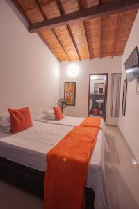 Postel nebo postele na pokoji v ubytování Hotel Palma De Sevilla