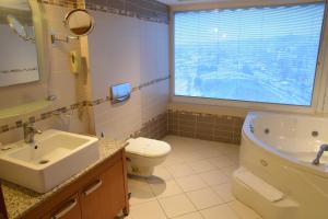 Kylpyhuone majoituspaikassa Vatan Asur Hotel