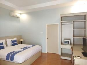 Postel nebo postele na pokoji v ubytování Cosè Gili Beach Resort