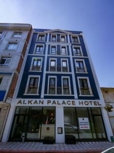 a blue building with aah mana palace hotel at ALKAN PALACE HOTEL in Keşan