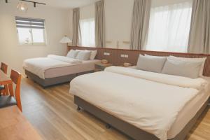 Voodi või voodid majutusasutuse Good Day Homestay toas