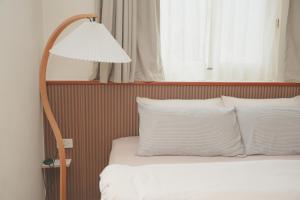Voodi või voodid majutusasutuse Good Day Homestay toas