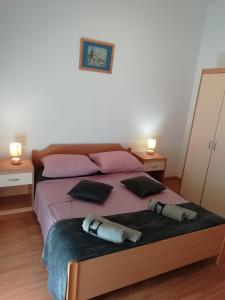 Postel nebo postele na pokoji v ubytování Apartman Ines