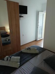 Postel nebo postele na pokoji v ubytování Apartman Ines