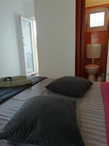 Postel nebo postele na pokoji v ubytování Apartman Ines
