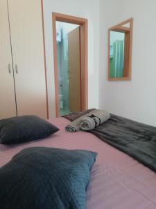 Postel nebo postele na pokoji v ubytování Apartman Ines