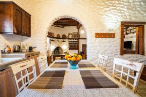Kuchyň nebo kuchyňský kout v ubytování Mannas House + 21 fotografií