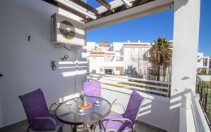 Balkón alebo terasa v ubytovaní Urbanización familiar LAS BRISAS 32 TERRAZA Y PISCINA Albert Villas