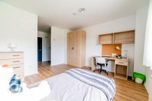 Postel nebo postele na pokoji v ubytování Micampus Logroño Student Residence