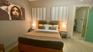 Postel nebo postele na pokoji v ubytování Halex room&food