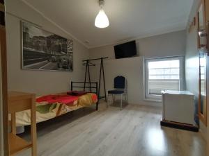 Postel nebo postele na pokoji v ubytování Hostel CENTRUM