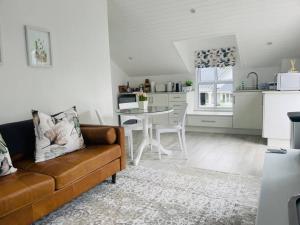 Η κουζίνα ή μικρή κουζίνα στο Quaint Gowrie Village Apartment