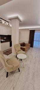 Zona d'estar a Alexys Top Residence Predeal